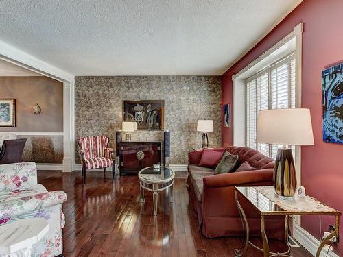 Salon - 169 Rue Spring Garden, Dollard-Des-Ormeaux, QC - Indoor Photo Showing Living Room With Fireplace