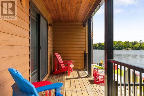 1211 Brydons Bay Road, Gravenhurst, ON - Outdoor With Body Of Water With Deck Patio Veranda With Exterior