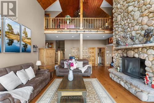 1211 Brydons Bay Road, Gravenhurst, ON - Indoor Photo Showing Living Room With Fireplace