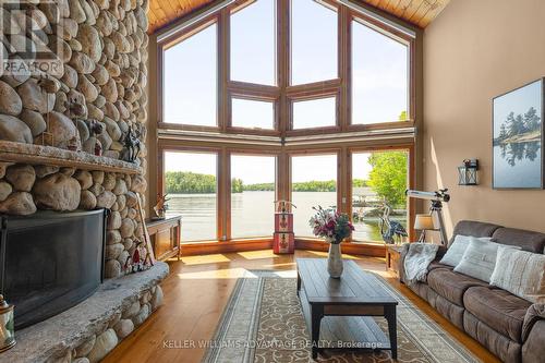 1211 Brydons Bay Road, Gravenhurst, ON - Indoor Photo Showing Living Room With Fireplace