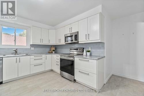 15 Southwood Drive, Kitchener, ON - Indoor Photo Showing Kitchen With Double Sink