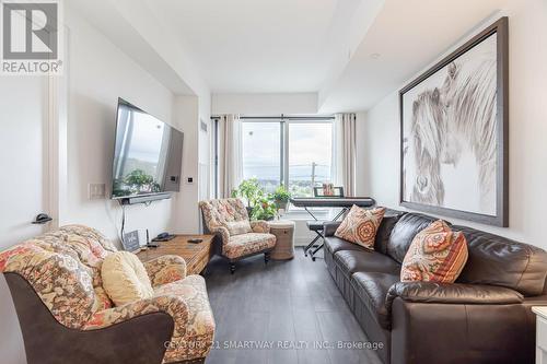 411 - 2450 Old Bronte Road, Oakville, ON - Indoor Photo Showing Living Room