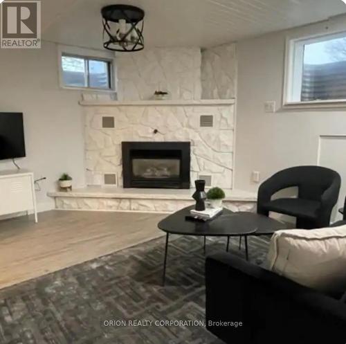 Bsmt - 1110 Pinegrove Road, Oakville, ON - Indoor Photo Showing Living Room With Fireplace