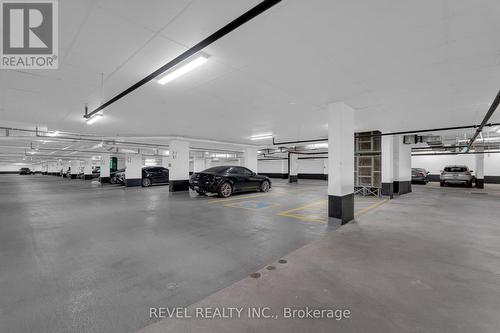 311 - 681 Yonge Street, Barrie, ON - Indoor Photo Showing Garage