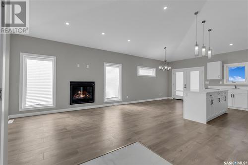 558 Fortosky Manor, Saskatoon, SK - Indoor Photo Showing Living Room With Fireplace