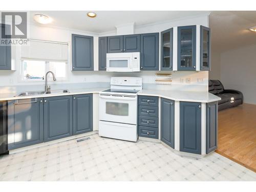 13 7100 Aldeen Road, Prince George, BC - Indoor Photo Showing Kitchen With Double Sink