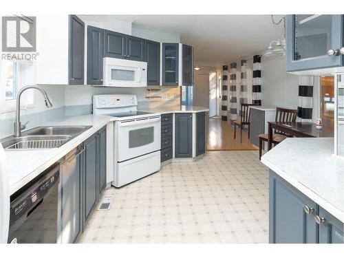 13 7100 Aldeen Road, Prince George, BC - Indoor Photo Showing Kitchen With Double Sink