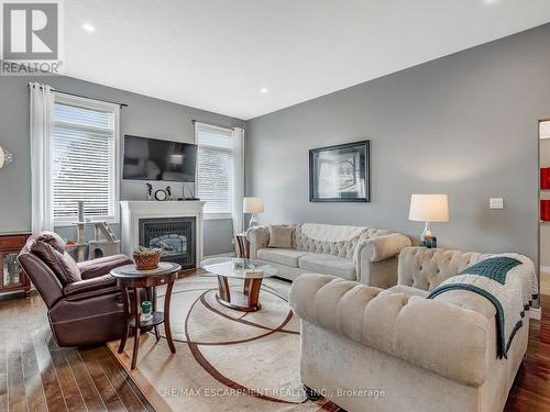 6 Kim Lane, Norfolk, ON - Indoor Photo Showing Living Room With Fireplace