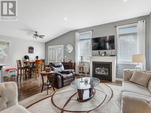 6 Kim Lane, Norfolk, ON - Indoor Photo Showing Living Room With Fireplace