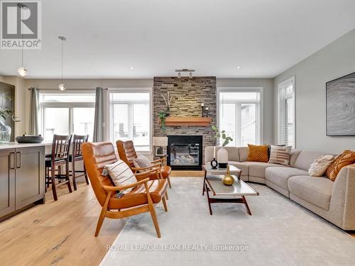 732 Brian Good Avenue, Ottawa, ON - Indoor Photo Showing Living Room With Fireplace