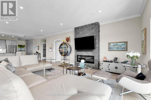 2702 - 505 Talbot Street, London, ON - Indoor Photo Showing Living Room With Fireplace