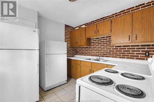 1041 Bruce Avenue Unit# Upper, Windsor, ON - Indoor Photo Showing Kitchen With Double Sink