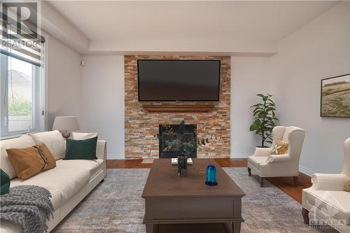 Family Room with Gas Fireplace - 107 Mangrove Crescent, Ottawa, ON - Indoor Photo Showing Living Room With Fireplace