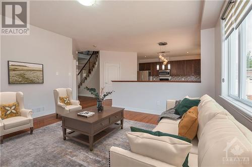 Family Room Open to Kitchen - 107 Mangrove Crescent, Ottawa, ON - Indoor Photo Showing Living Room