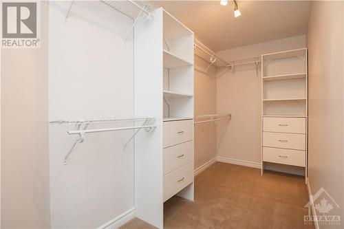 Oversized walk-in closet in Primary Suite - 107 Mangrove Crescent, Ottawa, ON - Indoor With Storage