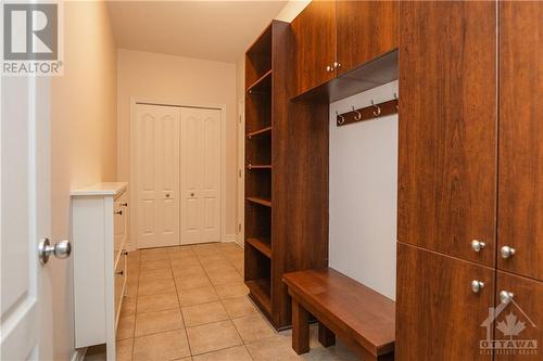 Mudroom from garage, with double closet and built-in storage. This space is dedicated to mudroom. Laundry is upstairs - 107 Mangrove Crescent, Ottawa, ON - Indoor Photo Showing Other Room