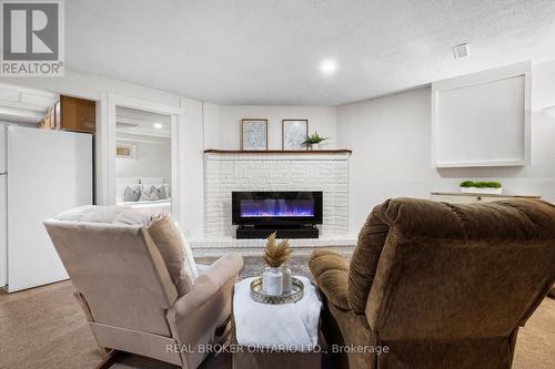 119 Wheatfield Crescent, Kitchener, ON - Indoor Photo Showing Living Room With Fireplace