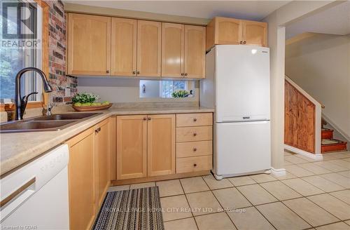 631 Holman Crescent, Centre Wellington, ON - Indoor Photo Showing Kitchen With Double Sink