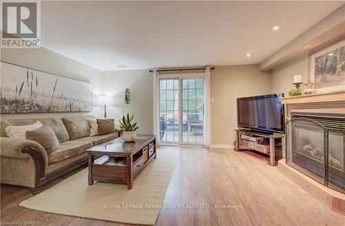 631 Holman Crescent, Centre Wellington, ON - Indoor Photo Showing Living Room With Fireplace