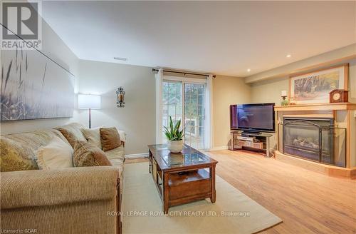 631 Holman Crescent, Centre Wellington, ON - Indoor Photo Showing Living Room With Fireplace