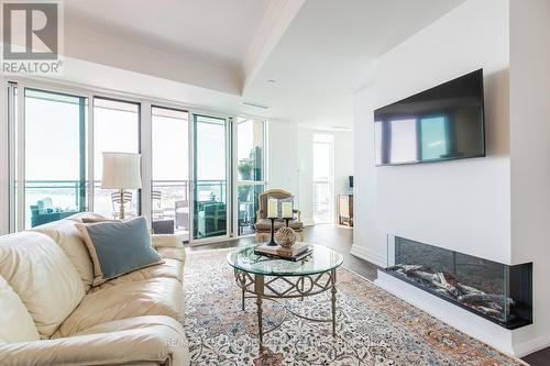 1401 - 2060 Lakeshore Road, Burlington, ON - Indoor Photo Showing Living Room With Fireplace