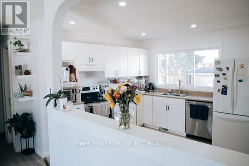 9614 77 Avenue, Grande Prairie, AB - Indoor Photo Showing Kitchen With Double Sink