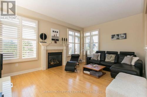 31 - 2295 Rochester Circle, Oakville, ON - Indoor Photo Showing Living Room With Fireplace