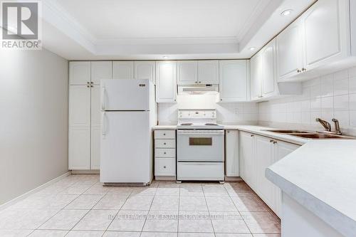 402 - 5070 Pinedale Avenue, Burlington, ON - Indoor Photo Showing Kitchen With Double Sink