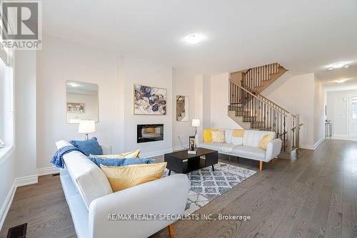 6 Del Grappa Street, Caledon, ON - Indoor Photo Showing Living Room With Fireplace