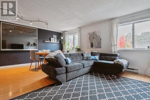 161 - 1066 Falgarwood Drive, Oakville, ON - Indoor Photo Showing Living Room