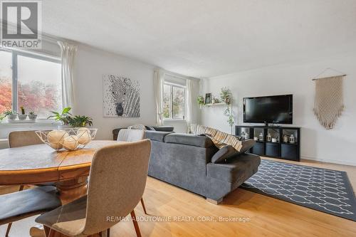 161 - 1066 Falgarwood Drive, Oakville, ON - Indoor Photo Showing Living Room