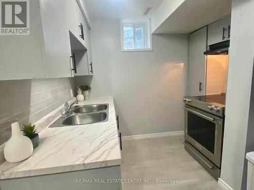 Unit A - 5266 Huntingfield Drive, Mississauga, ON - Indoor Photo Showing Kitchen With Double Sink