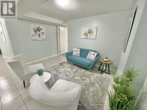 Lower - 5266 Huntingfield Drive, Mississauga, ON - Indoor Photo Showing Living Room