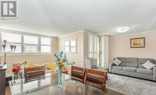 402 - 2900 Battleford Road, Mississauga, ON - Indoor Photo Showing Living Room