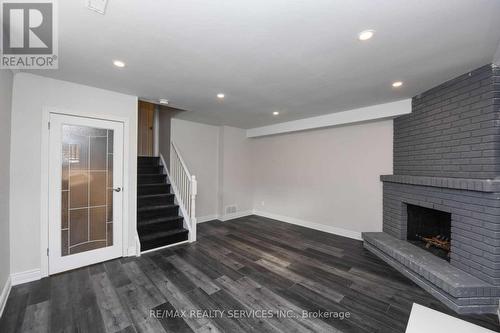 4 Simmons (Basement) Boulevard, Brampton, ON - Indoor Photo Showing Other Room With Fireplace