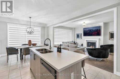 1058 Thompson Drive, Oshawa, ON - Indoor Photo Showing Kitchen With Fireplace With Double Sink