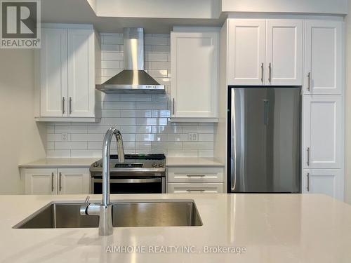 218 - 131 Honeycrisp Crescent, Vaughan, ON - Indoor Photo Showing Kitchen With Double Sink With Upgraded Kitchen