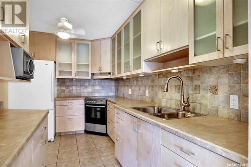 501 3520 Hillsdale Street, Regina, SK - Indoor Photo Showing Kitchen With Double Sink