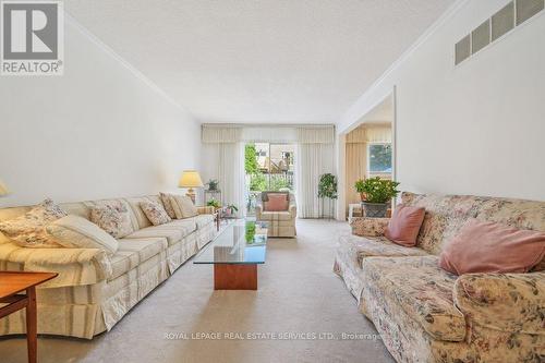 16 Rooksnest Trail, Toronto, ON - Indoor Photo Showing Living Room