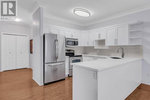 2300 Benvoulin Road Unit# 212, Kelowna, BC - Indoor Photo Showing Kitchen With Stainless Steel Kitchen