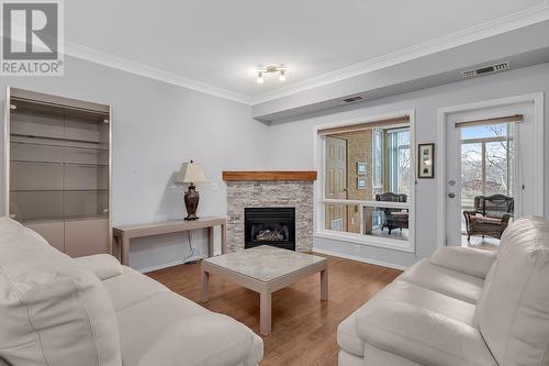 2300 Benvoulin Road Unit# 212, Kelowna, BC - Indoor Photo Showing Living Room With Fireplace