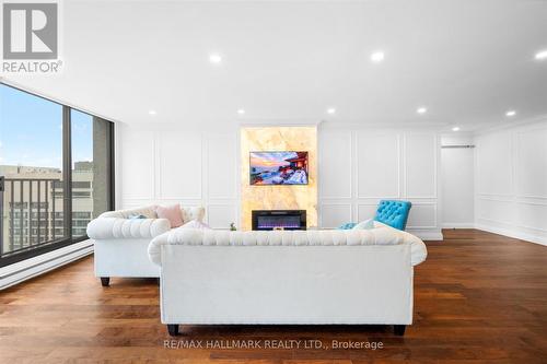 Ph12 - 55 Harbour Square, Toronto, ON - Indoor Photo Showing Living Room With Fireplace