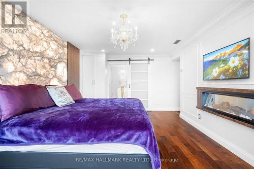 Ph12 - 55 Harbour Square, Toronto, ON - Indoor Photo Showing Bedroom With Fireplace