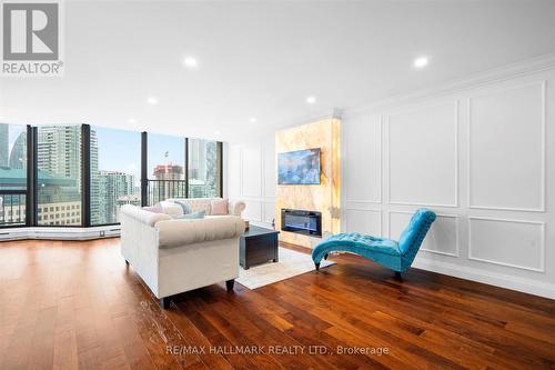 Ph12 - 55 Harbour Square, Toronto, ON - Indoor Photo Showing Living Room With Fireplace