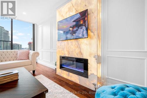 Ph12 - 55 Harbour Square, Toronto, ON - Indoor Photo Showing Living Room With Fireplace