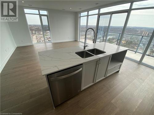 15 Glebe Street Unit# 1813, Cambridge, ON - Indoor Photo Showing Kitchen With Double Sink