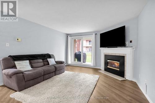 14 - 140 Conway Drive, London, ON - Indoor Photo Showing Living Room With Fireplace