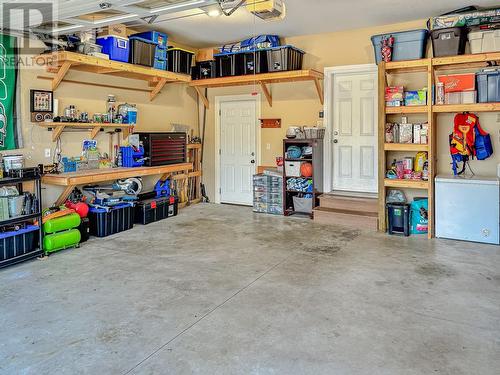 Nice double car garage - 1791 23 Street Ne, Salmon Arm, BC - Indoor Photo Showing Garage