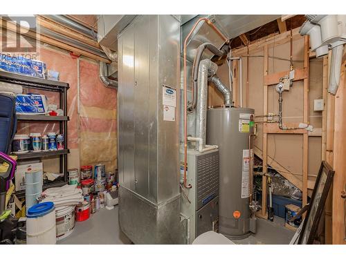 Utility room with 60 gal HWT - 1791 23 Street Ne, Salmon Arm, BC - Indoor Photo Showing Basement