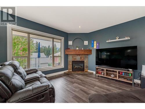 Living room - 1791 23 Street Ne, Salmon Arm, BC - Indoor Photo Showing Living Room With Fireplace